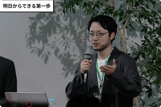 NPreport_樋口が講演している様子